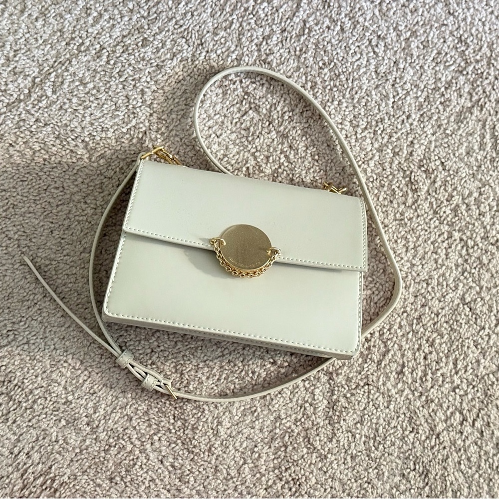 Charles & Keith Cream Crossbody Bag with Gold Accent
